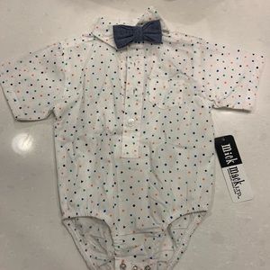 Two button up shirts. Never worn and super cute, lol me has a bow tie on it!